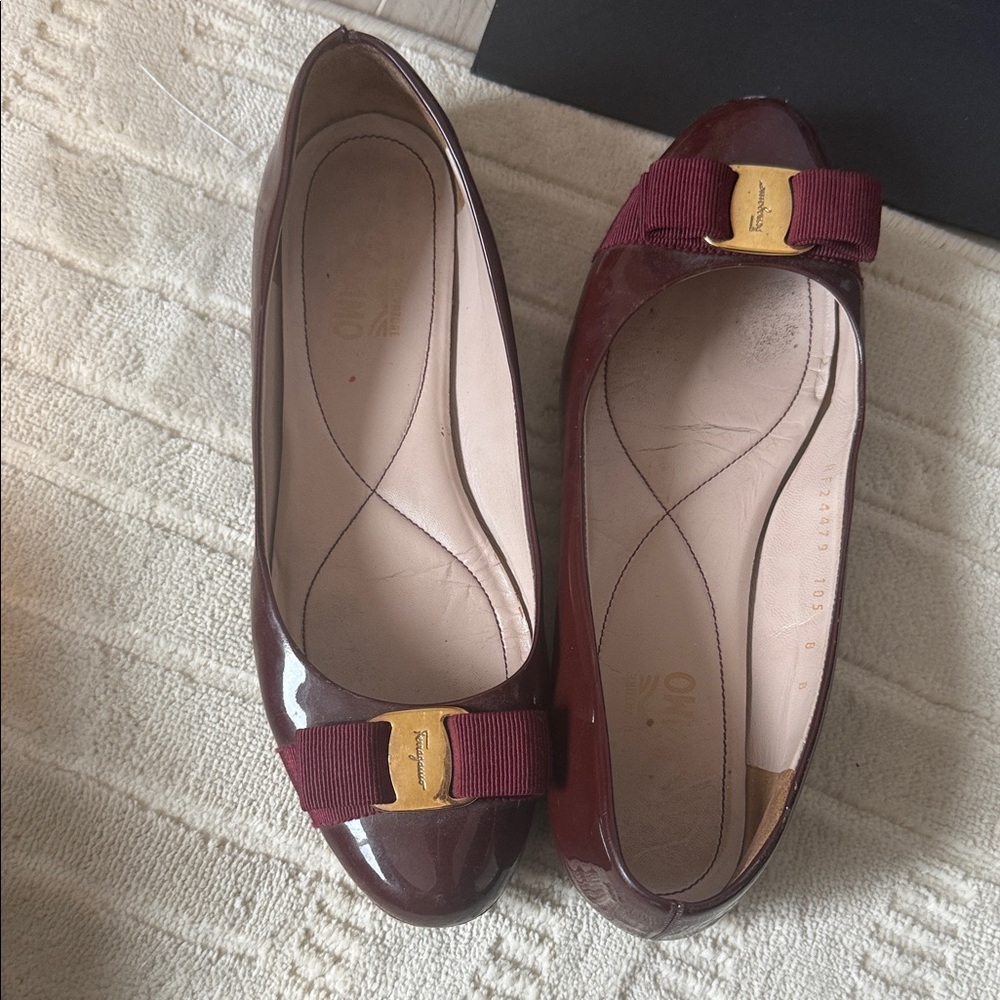 Elegant Ferragamo Burgundy Patent Leather Flats with Bow Accent